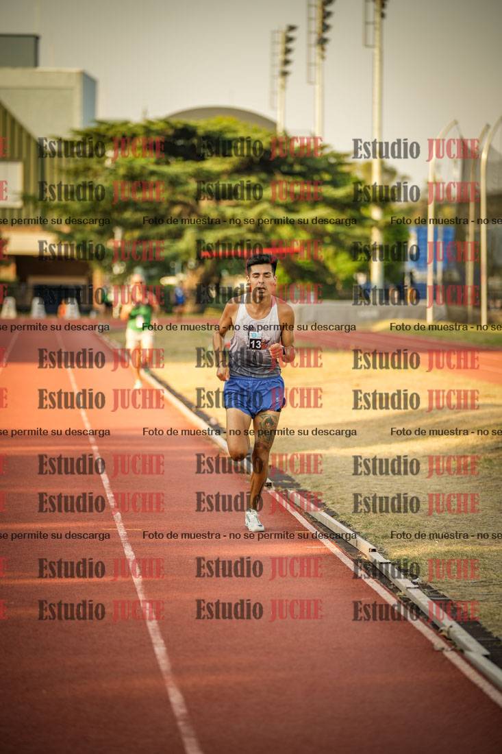 Fotos de los 5000 m llanos de mujeres y varones