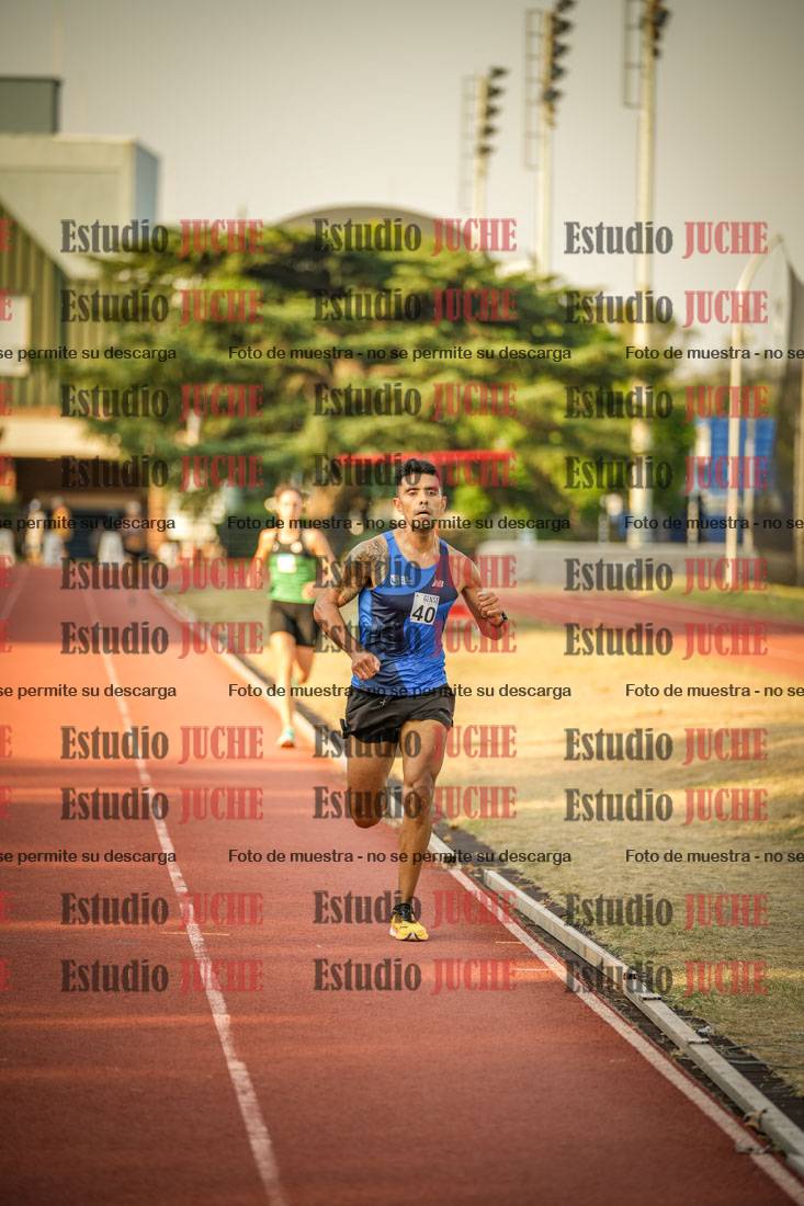 Fotos de los 5000 m llanos de mujeres y varones