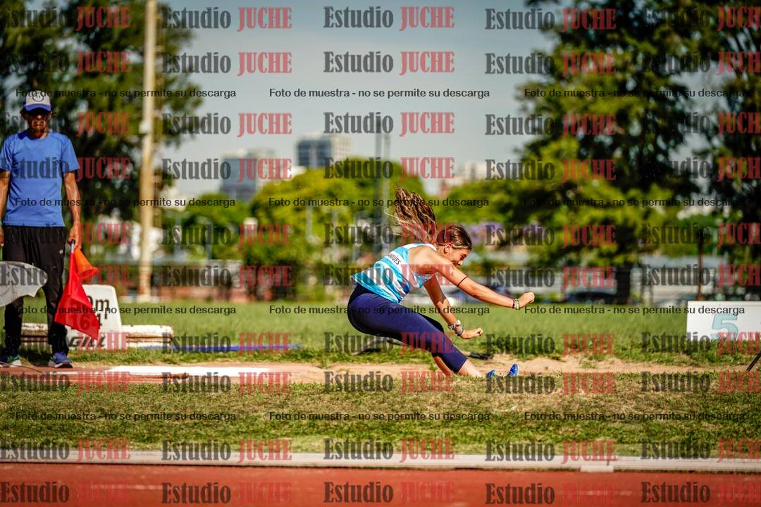 Fotos del salto en largo de mujeres