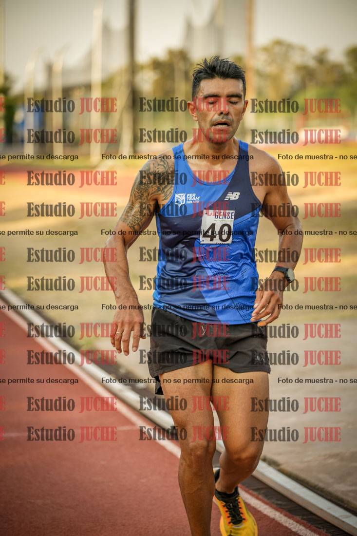 Fotos de los 5000 m llanos de mujeres y varones