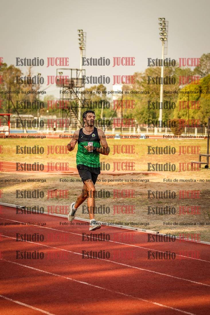 Fotos de los 5000 m llanos de mujeres y varones
