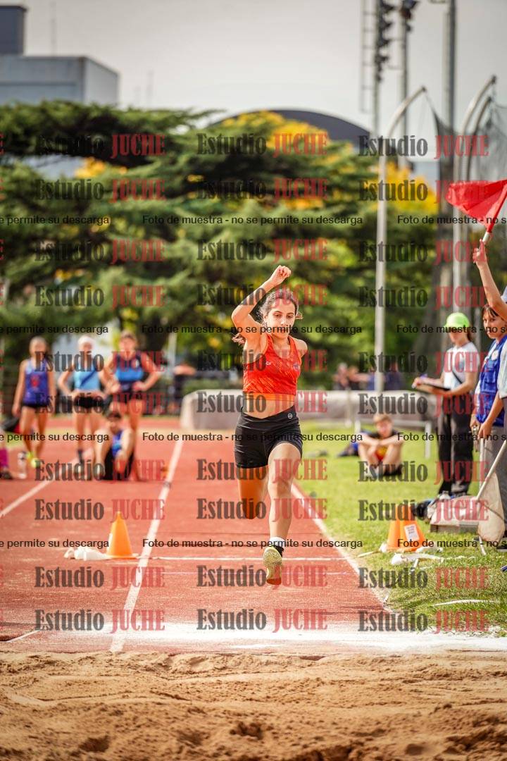 Fotos del salto triple de mujeres y varones