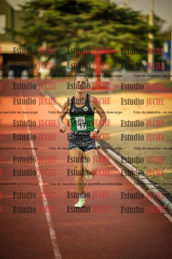 Fotos de los 5000 m llanos de mujeres y varones