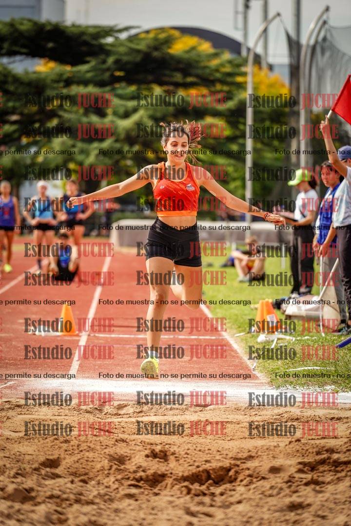 Fotos del salto triple de mujeres y varones
