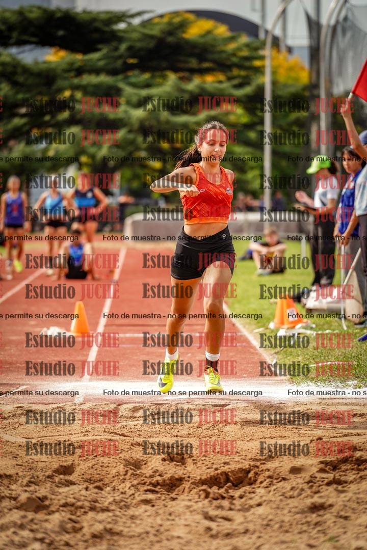 Fotos del salto triple de mujeres y varones