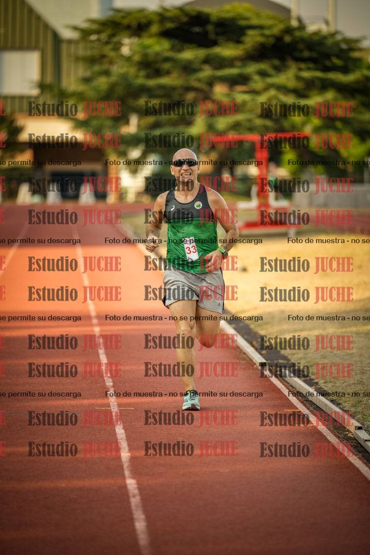 Fotos de los 5000 m llanos de mujeres y varones