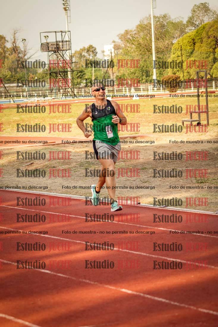 Fotos de los 5000 m llanos de mujeres y varones