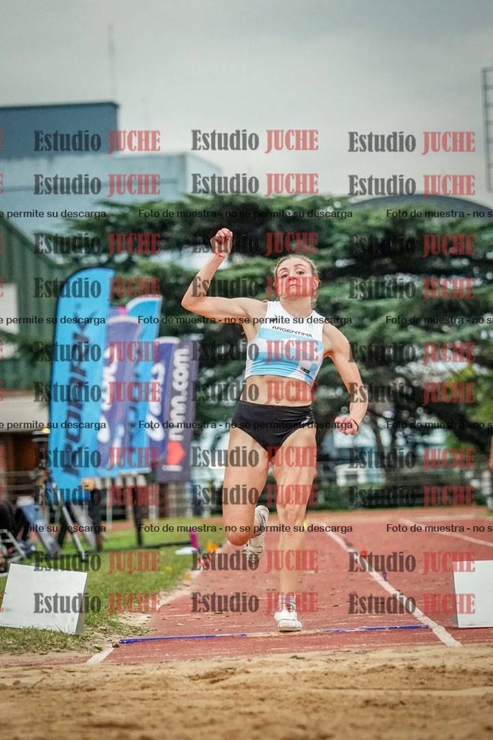 Fotos del salto en largo de mujeres