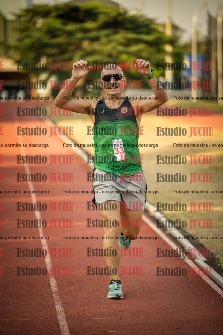 Fotos de los 5000 m llanos de mujeres y varones