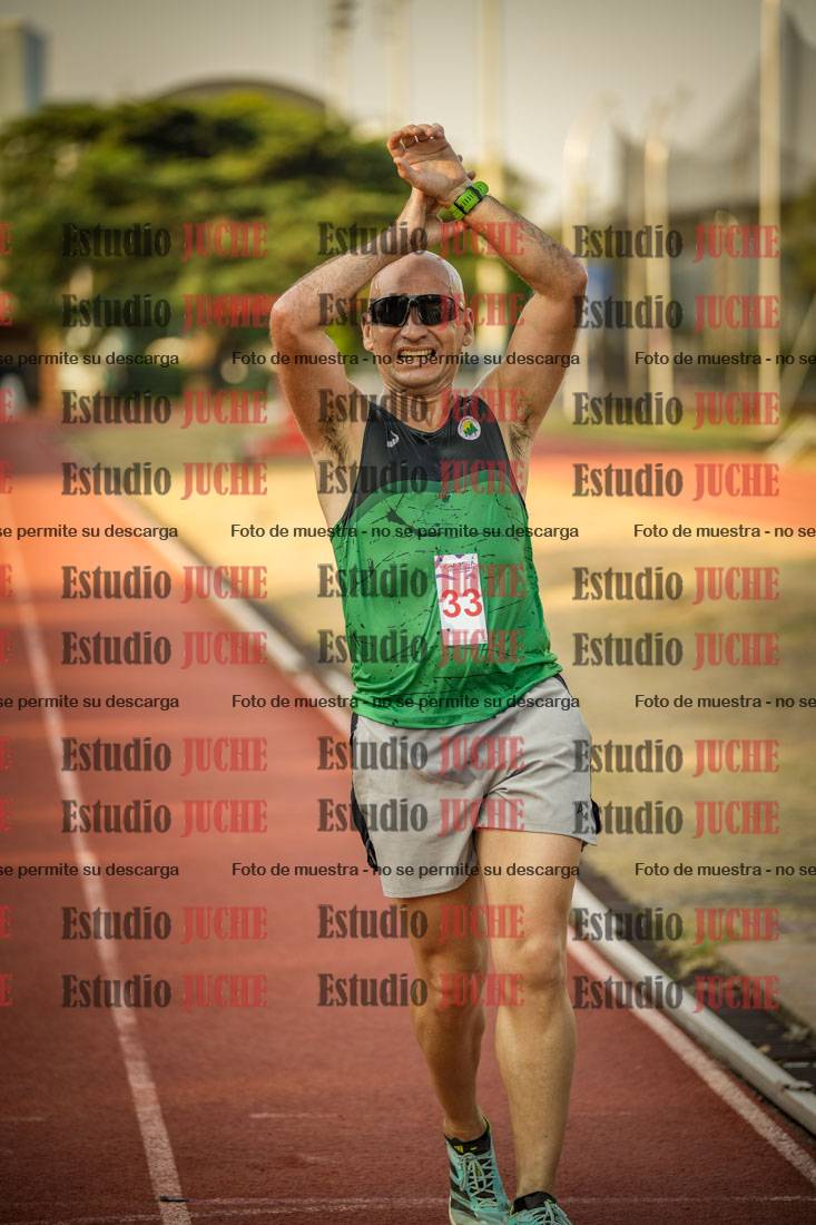 Fotos de los 5000 m llanos de mujeres y varones