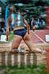 Fotos del salto en largo de mujeres
