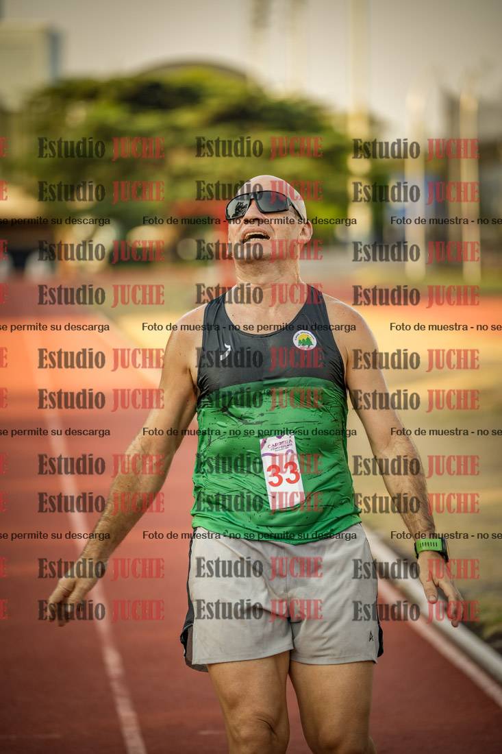 Fotos de los 5000 m llanos de mujeres y varones