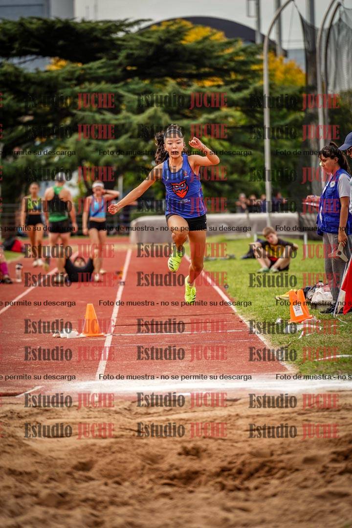 Fotos del salto triple de mujeres y varones