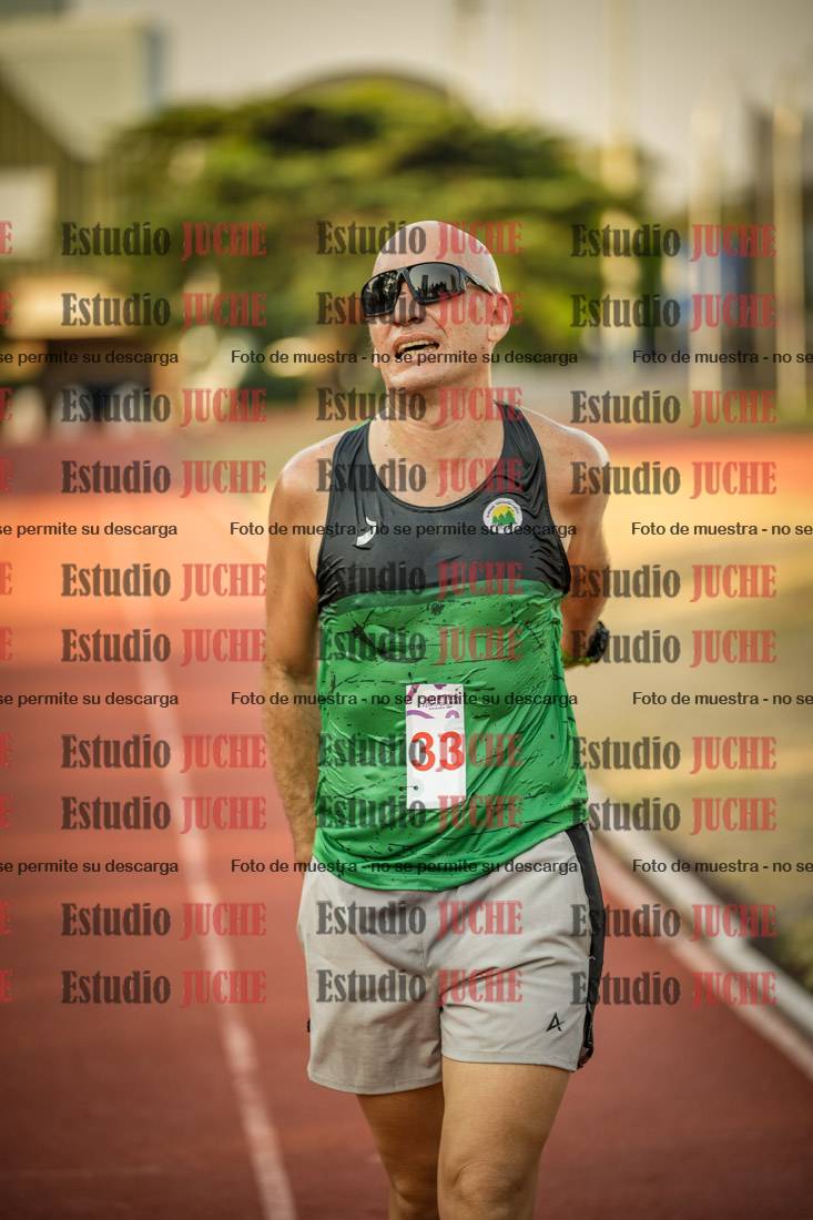Fotos de los 5000 m llanos de mujeres y varones