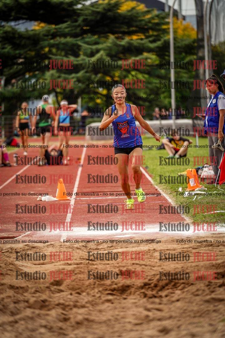 Fotos del salto triple de mujeres y varones