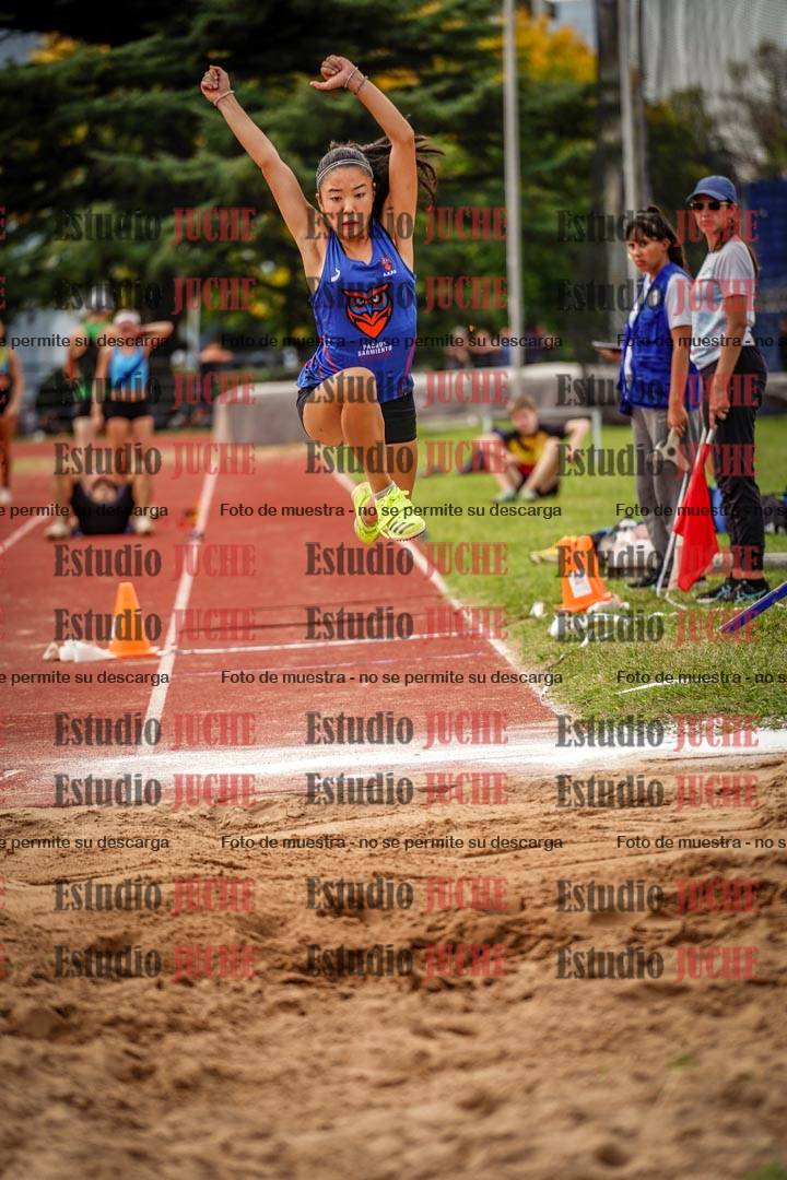 Fotos del salto triple de mujeres y varones