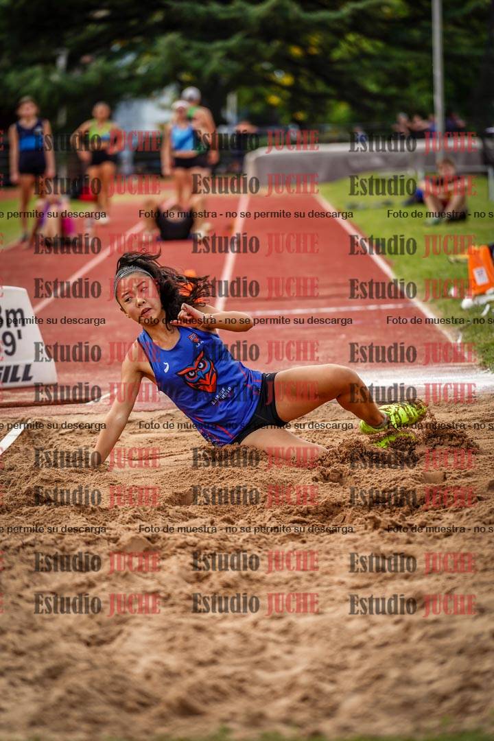 Fotos del salto triple de mujeres y varones