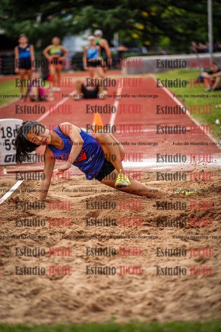 Fotos del salto triple de mujeres y varones