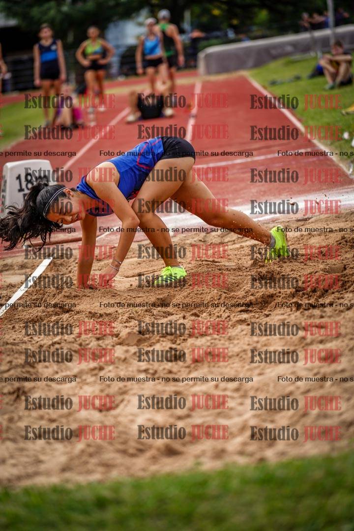 Fotos del salto triple de mujeres y varones