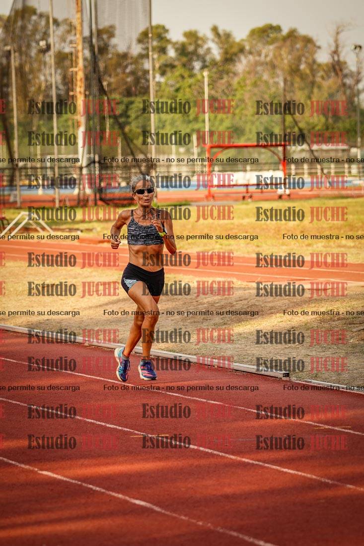 Fotos de los 5000 m llanos de mujeres y varones