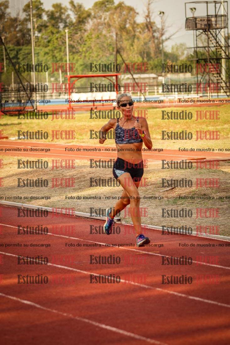 Fotos de los 5000 m llanos de mujeres y varones