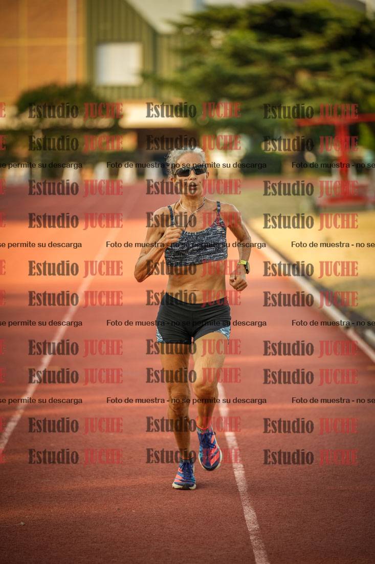 Fotos de los 5000 m llanos de mujeres y varones