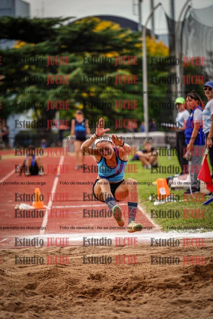 Fotos del salto triple de mujeres y varones