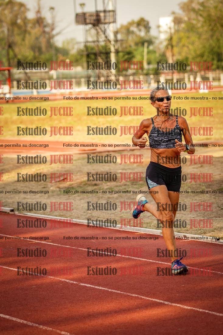 Fotos de los 5000 m llanos de mujeres y varones