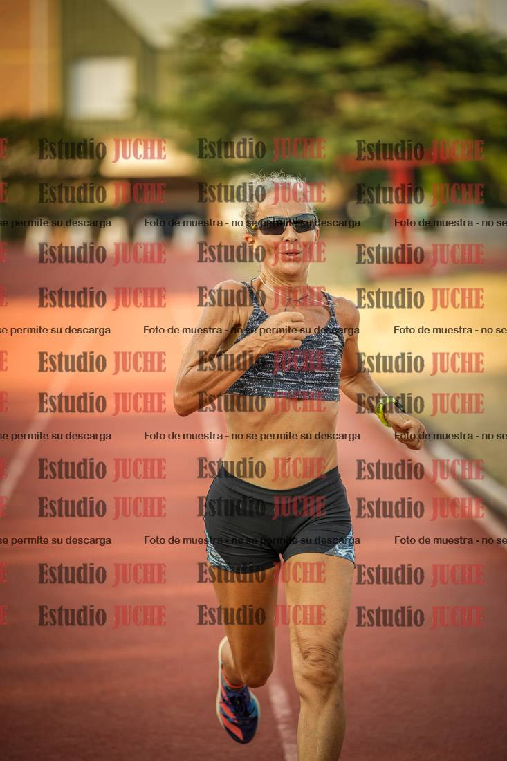 Fotos de los 5000 m llanos de mujeres y varones
