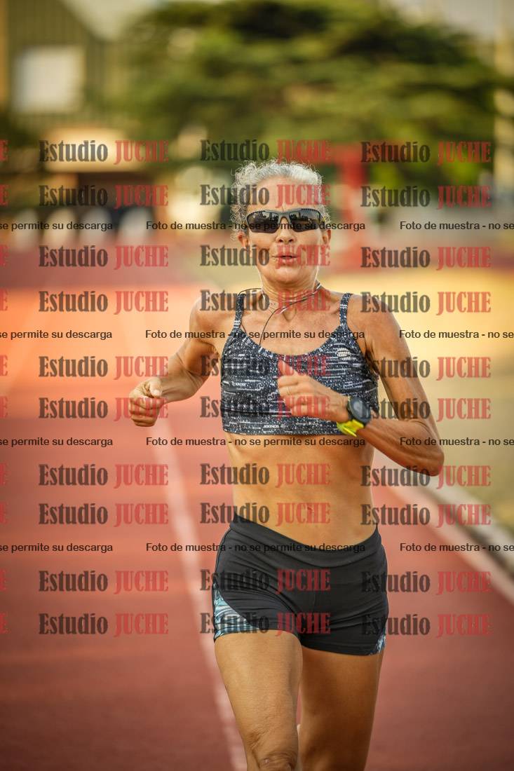 Fotos de los 5000 m llanos de mujeres y varones