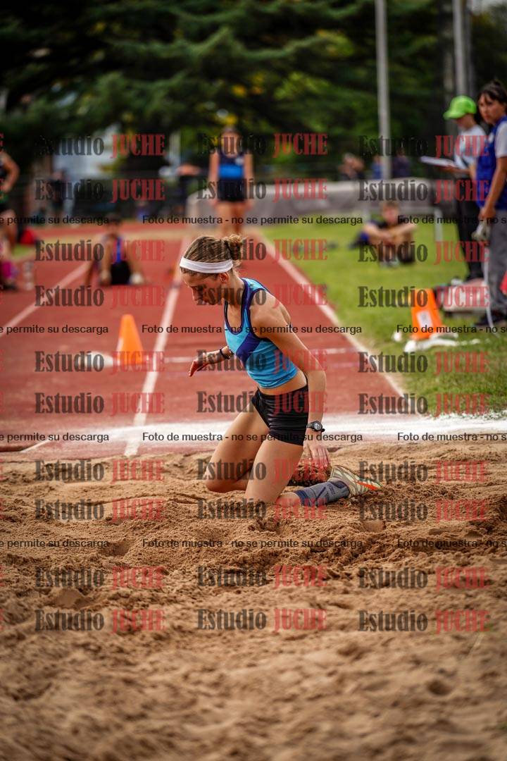Fotos del salto triple de mujeres y varones