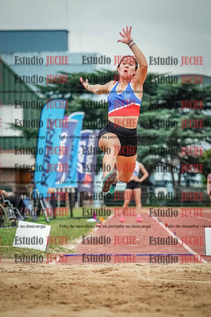 Fotos del salto en largo de mujeres