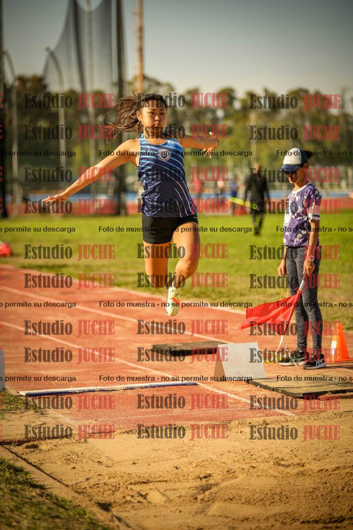 Fotos del salto en largo de mujeres