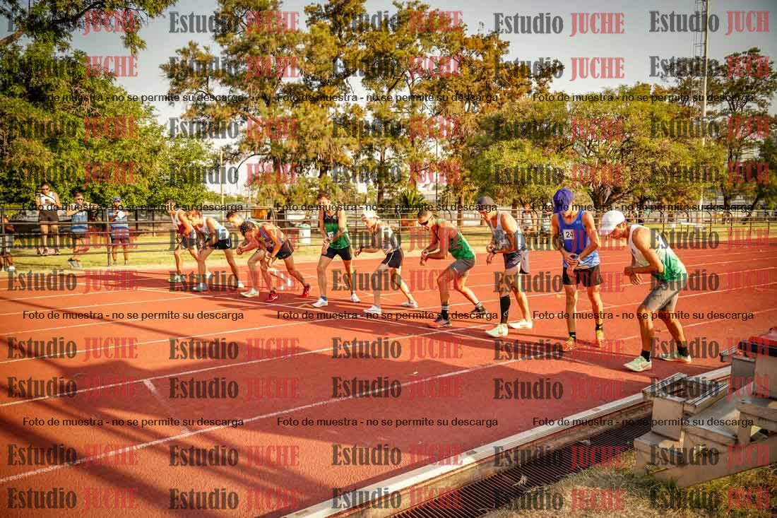 Fotos de los 5000 m llanos de mujeres y varones