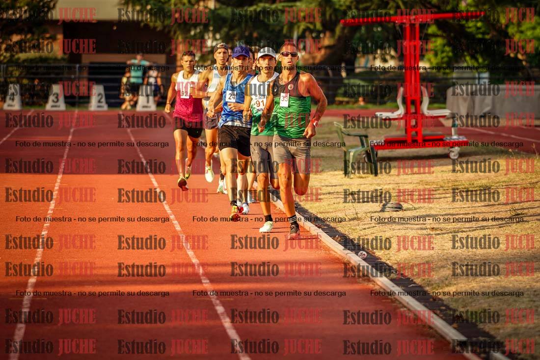 Fotos de los 5000 m llanos de mujeres y varones