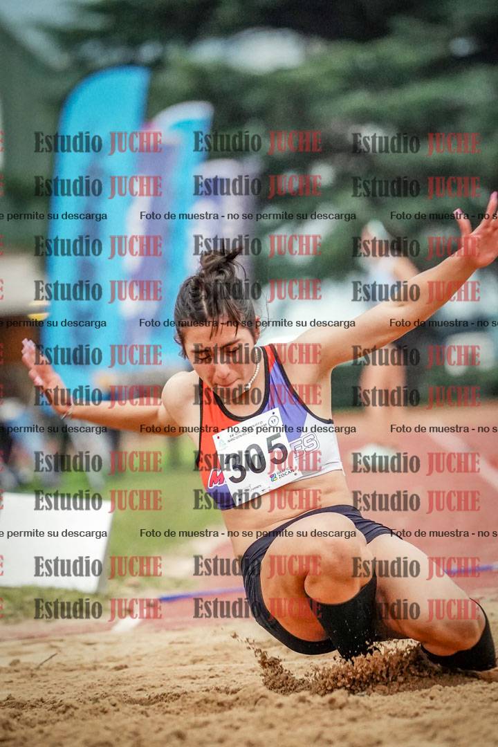 Fotos del salto en largo de mujeres