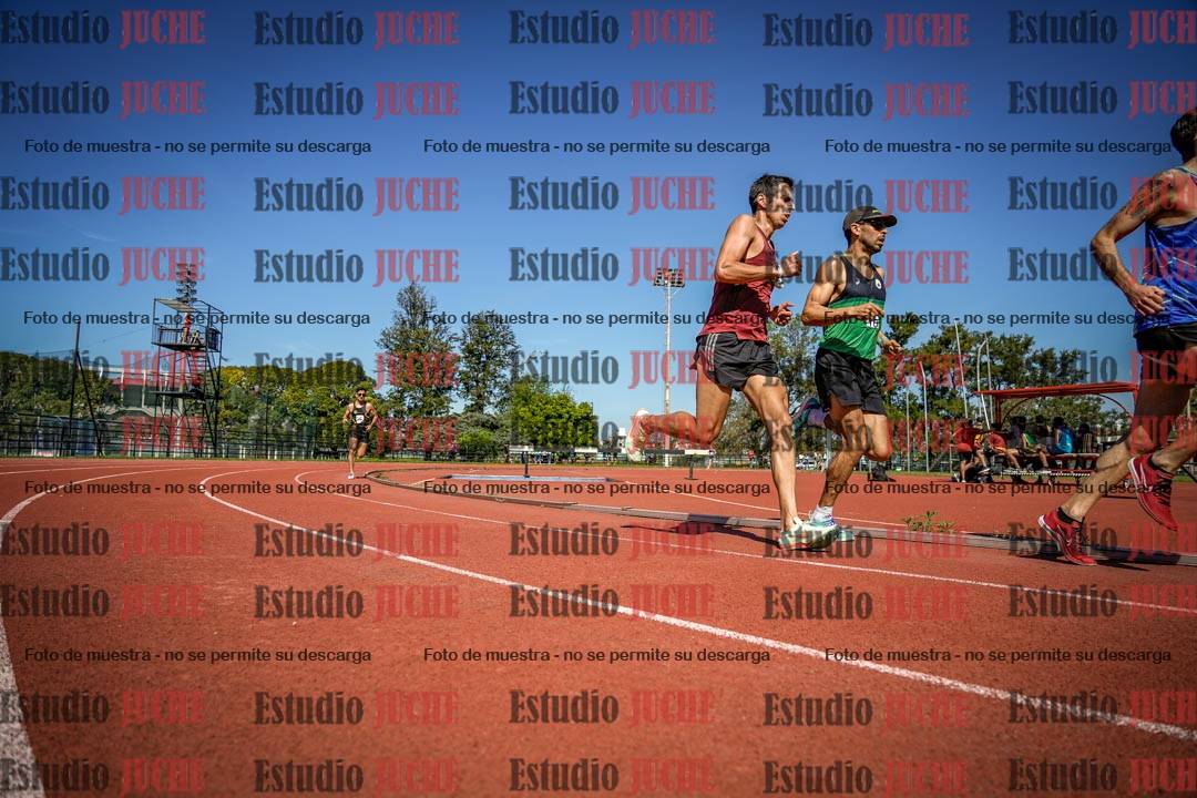 Fotos de los 5000 m llanos de mujeres y varones