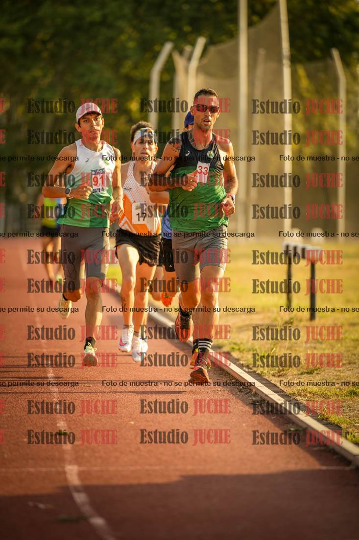Fotos de los 5000 m llanos de mujeres y varones