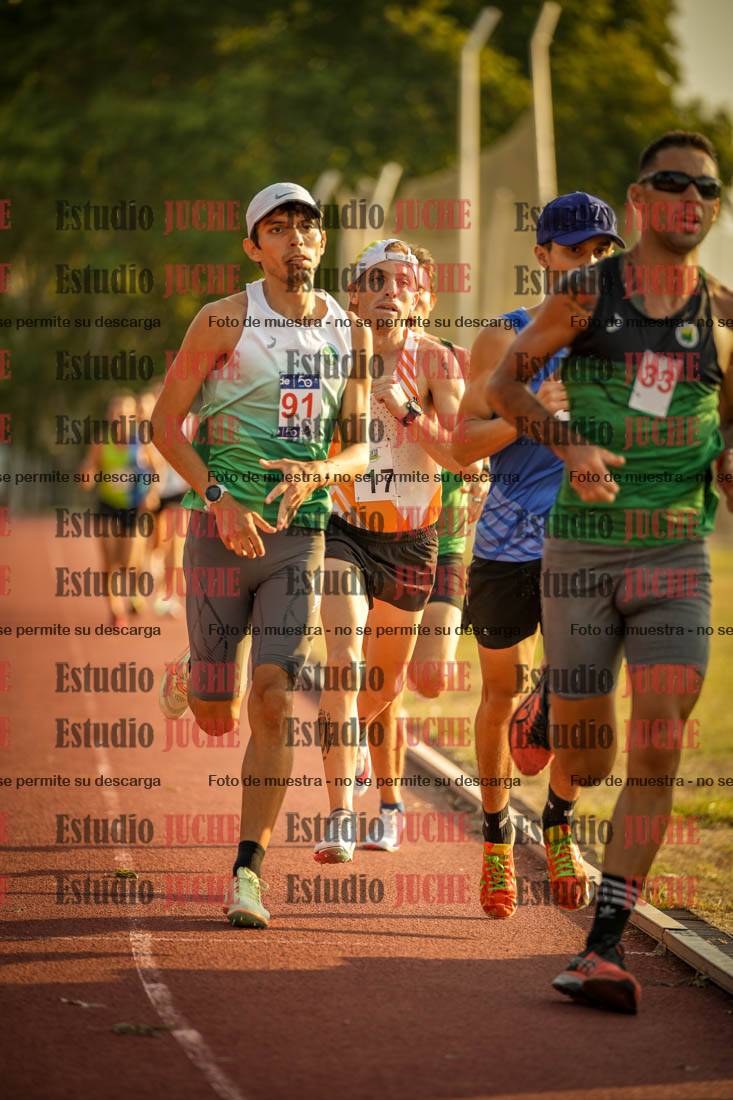 Fotos de los 5000 m llanos de mujeres y varones