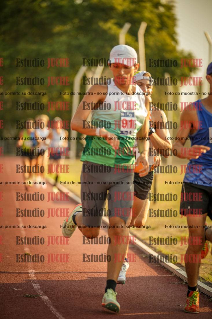 Fotos de los 5000 m llanos de mujeres y varones