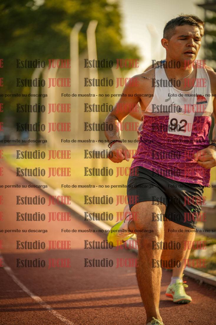 Fotos de los 5000 m llanos de mujeres y varones