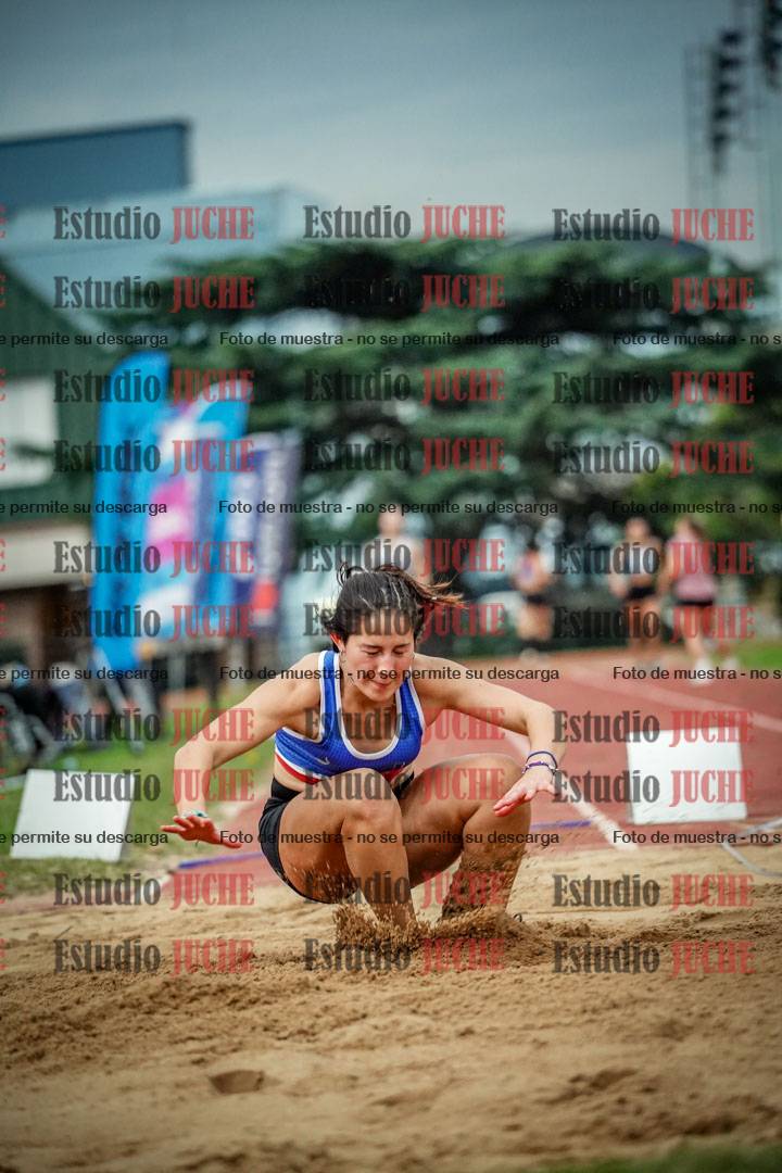 Fotos del salto en largo de mujeres