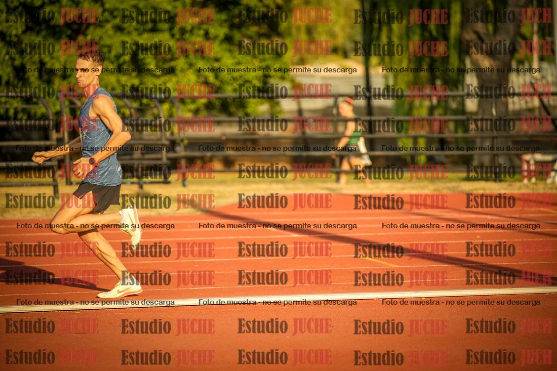 Fotos de los 5000 m llanos de mujeres y varones