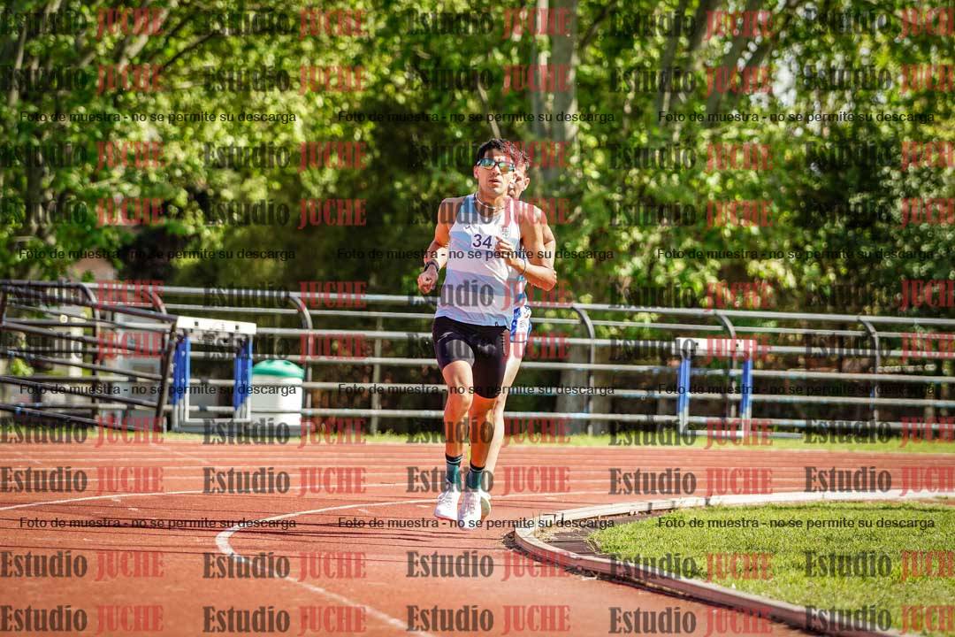 Fotos de los 5000 m llanos de mujeres y varones