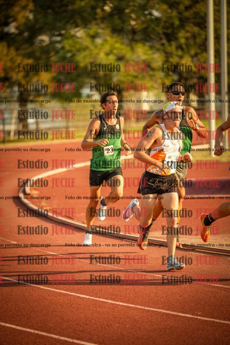 Fotos de los 5000 m llanos de mujeres y varones
