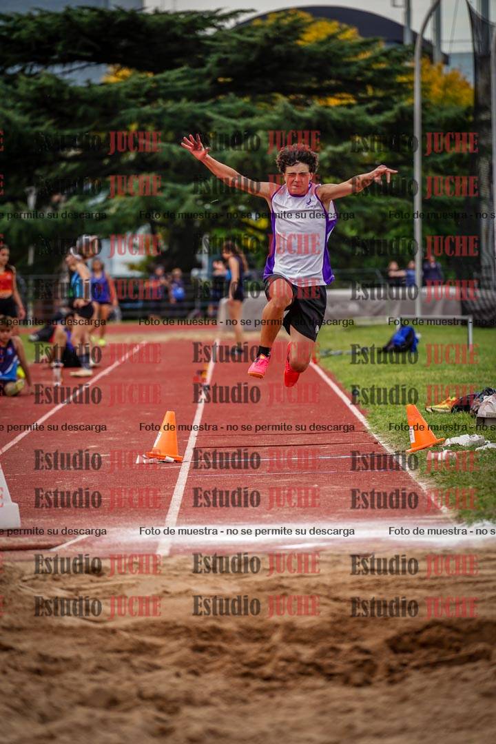 Fotos del salto triple de mujeres y varones