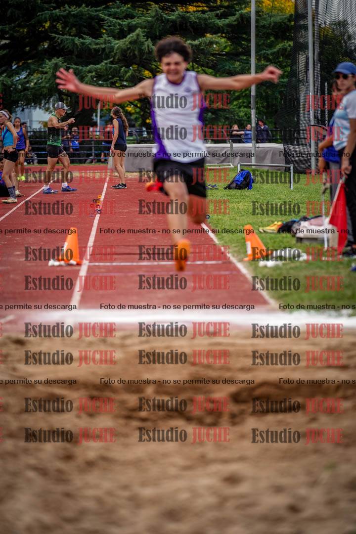 Fotos del salto triple de mujeres y varones
