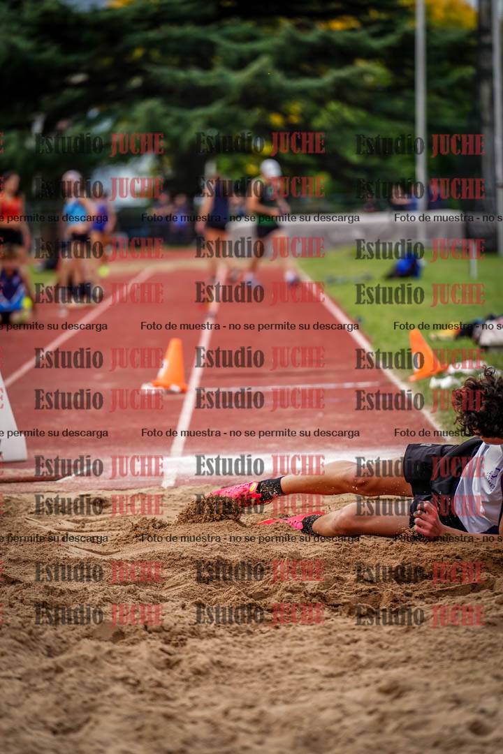 Fotos del salto triple de mujeres y varones
