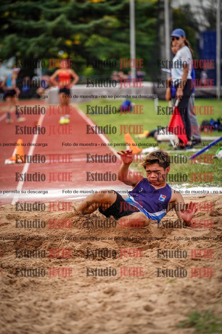 Fotos del salto triple de mujeres y varones