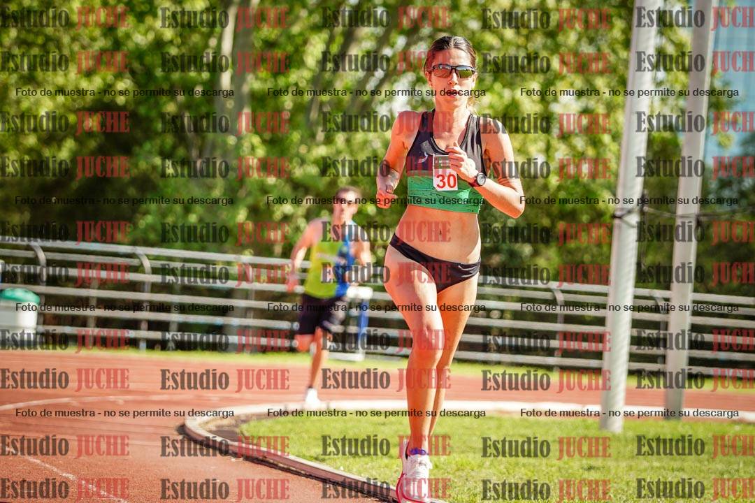 Fotos de los 5000 m llanos de mujeres y varones